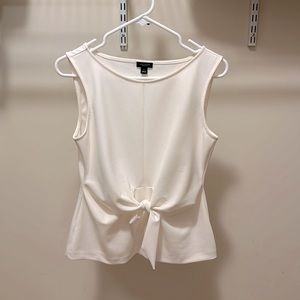 Sleeveless knotted ivory peplum blouse